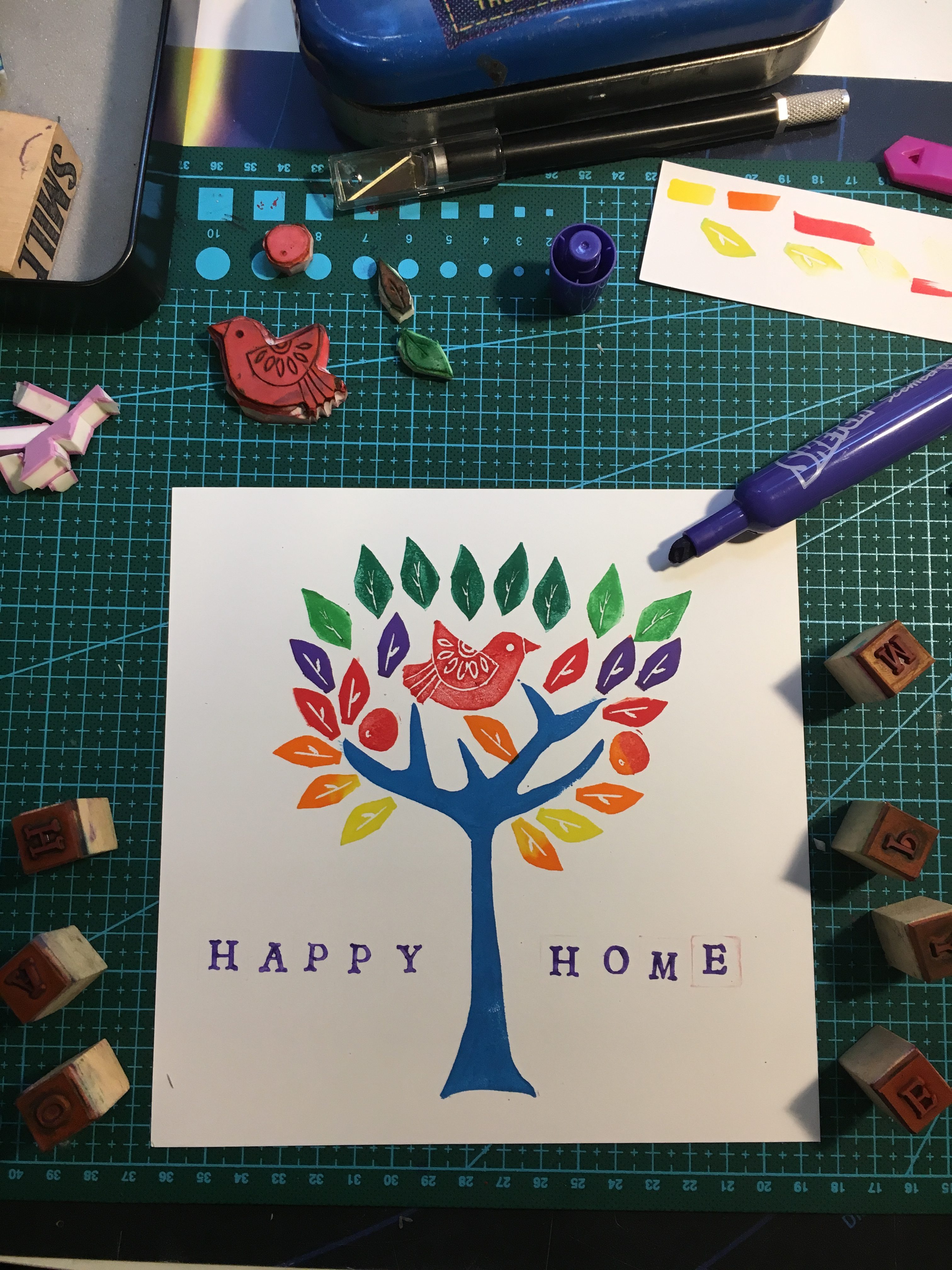 Colorful print made with hand carved stamps